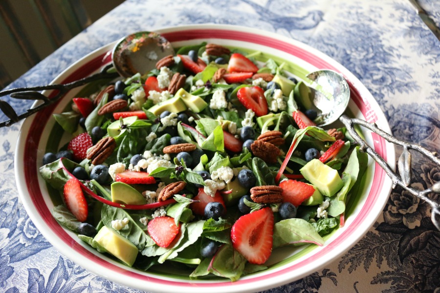 Berry Basil Harvest Salad loaded with fresh basil, candied pecans, blue cheese, blueberries and strawberries. Perfection! 