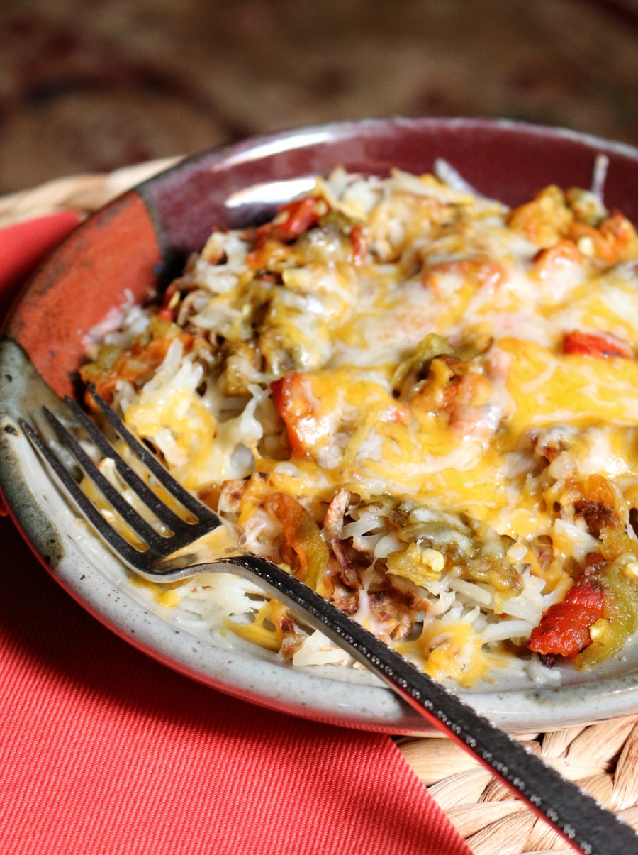 Southwestern Hash Browns - Crispy Hash Browns topped with fresh roasted New Mexico green chile and cheddar cheese. Delish!