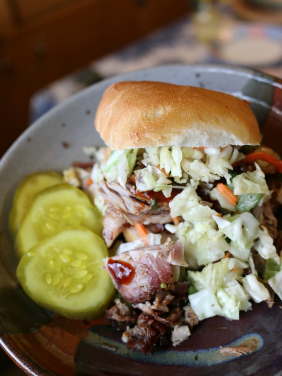 Delicious Spicy Pulled Pork Sliders topped with coleslaw.