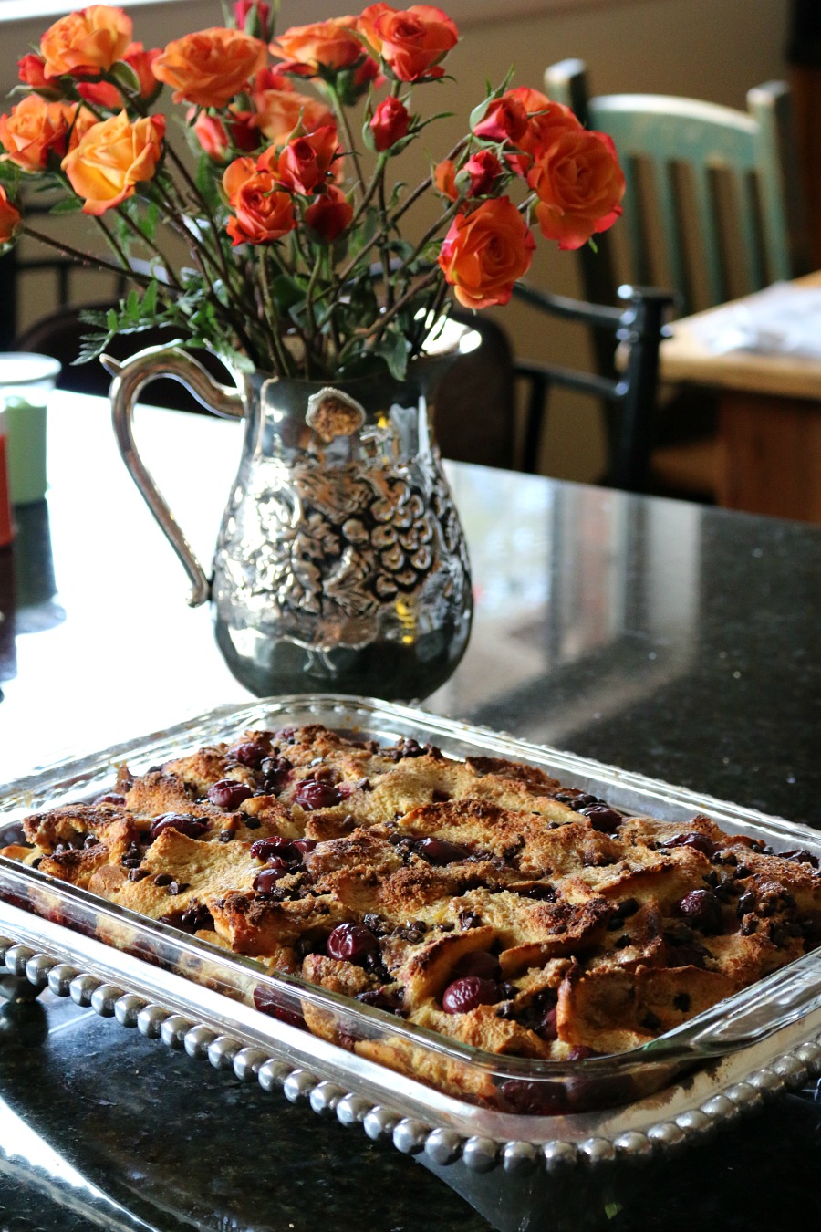 This would be the perfect brunch recipe. The perfect dessert, warm bread pudding with cherries and dark chocolate. Topped with whipped cream and hot fudge sauce. Decadent and delicious. || www.ceceliasgoodstuff.com