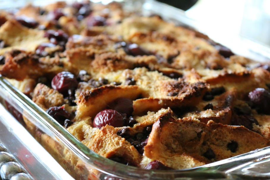 This would be the perfect brunch recipe. The perfect dessert, warm bread pudding with cherries and dark chocolate. Topped with whipped cream and hot fudge sauce. Decadent and delicious. || www.ceceliasgoodstuff.com