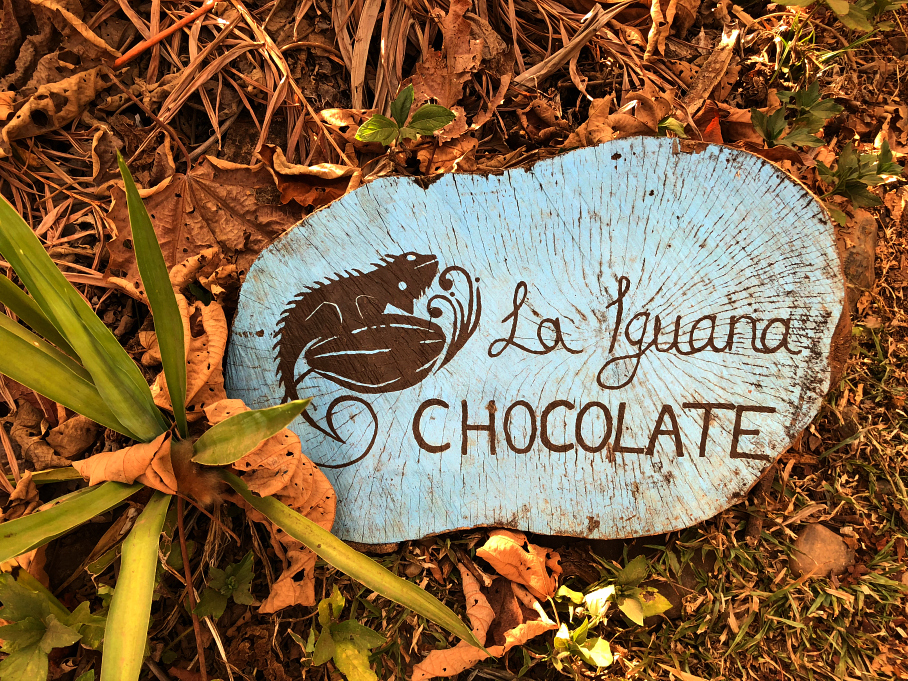 A wooden sign for La Iguana Chocolate, Costa Rica