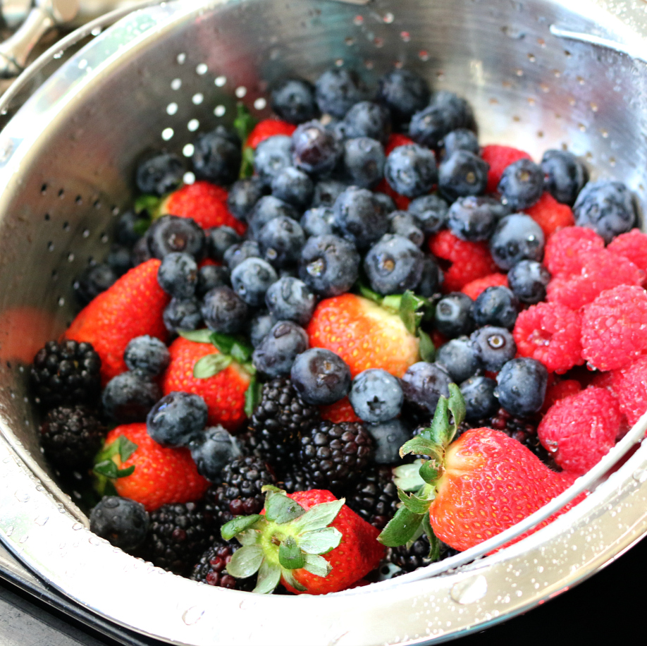 A Very Berry Fruit Salad - wash the berries under cold water. CeceliasGoodStuff.com